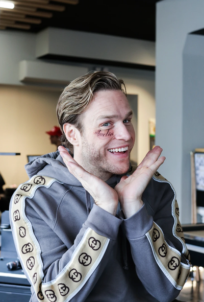 Olly Murs getting a tattoo at Inkd London studio